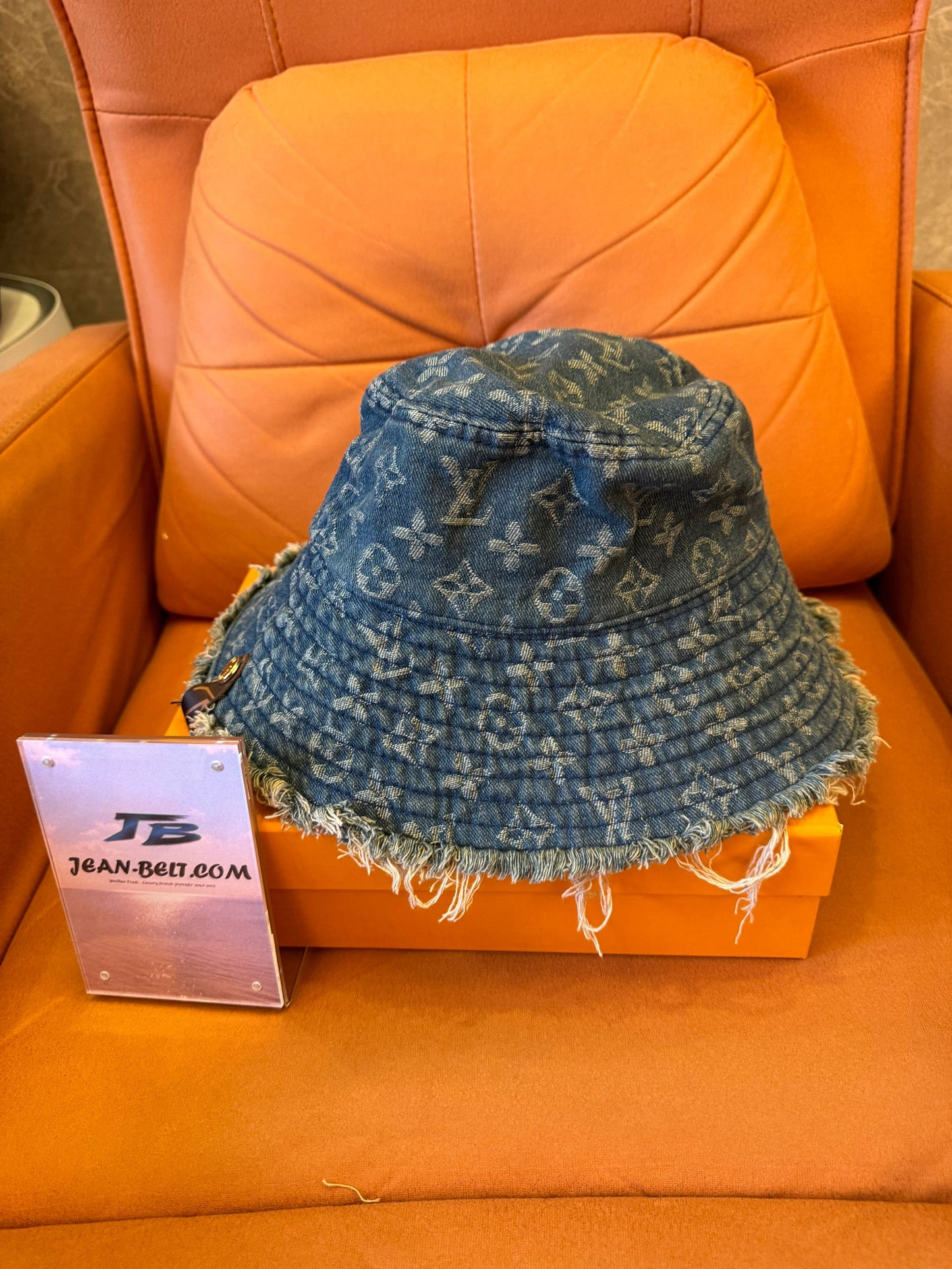 Louis Vuitton denim monogram bucket hat with frayed edges