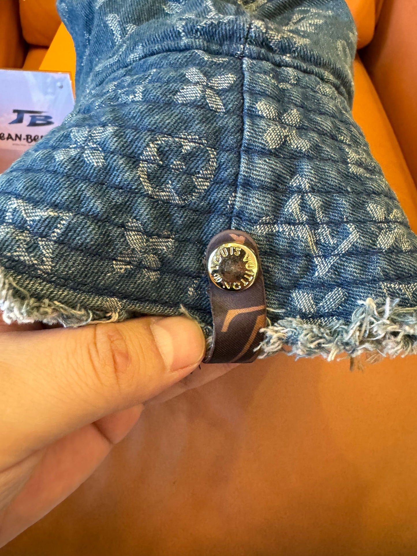 Louis Vuitton denim monogram bucket hat with frayed edges