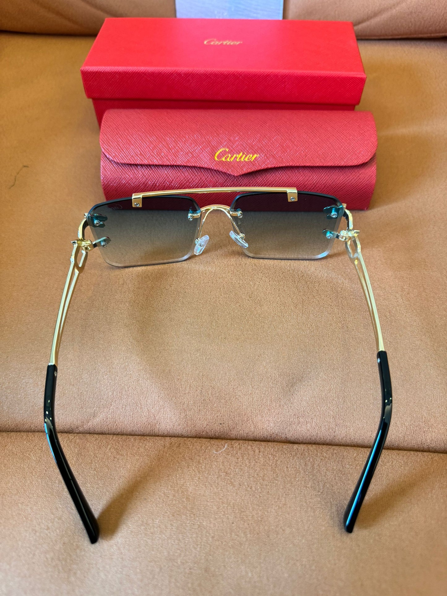 Cartier rimless gold panther sunglasses