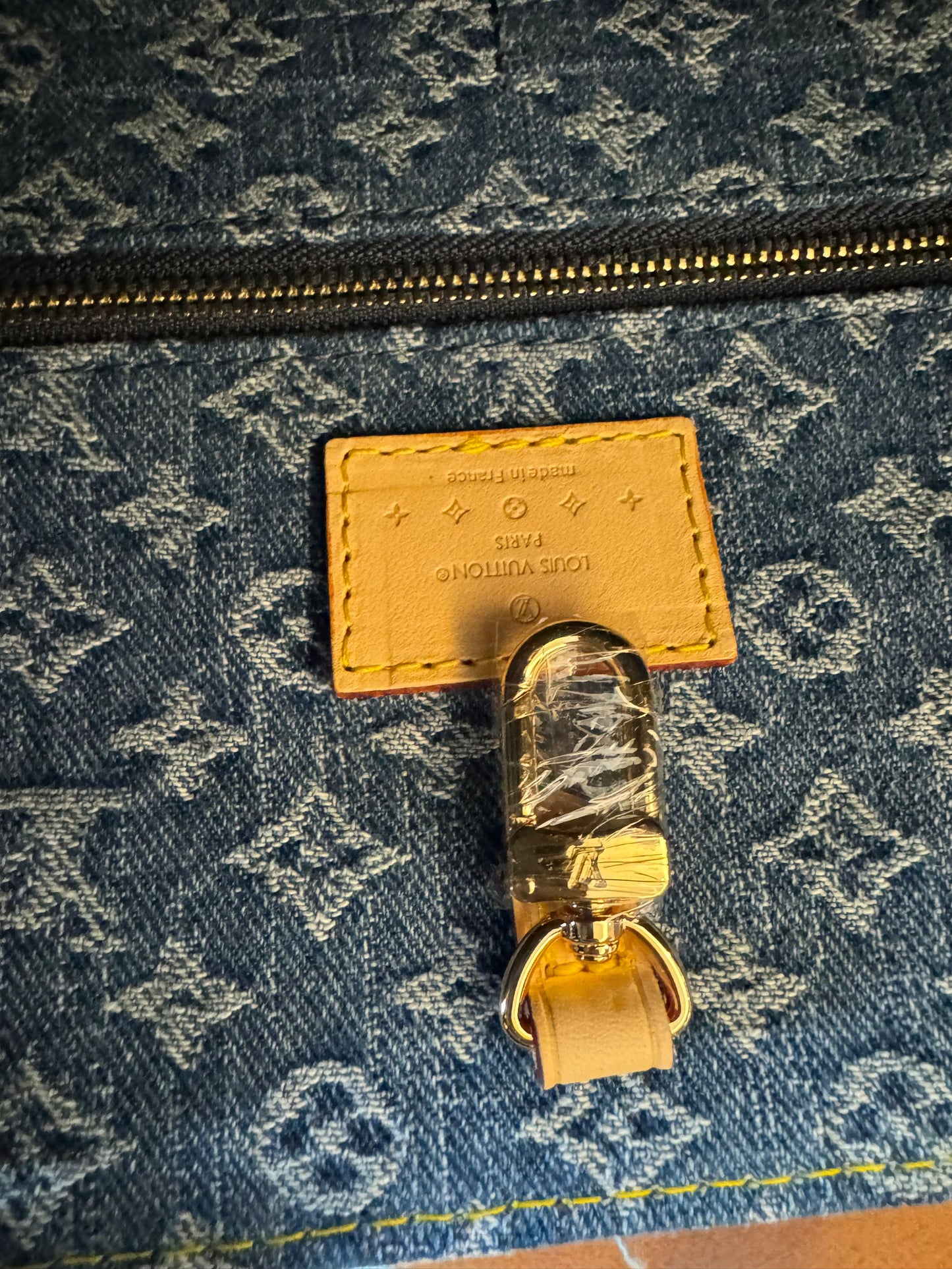 Louis Vuitton onthego denim bag