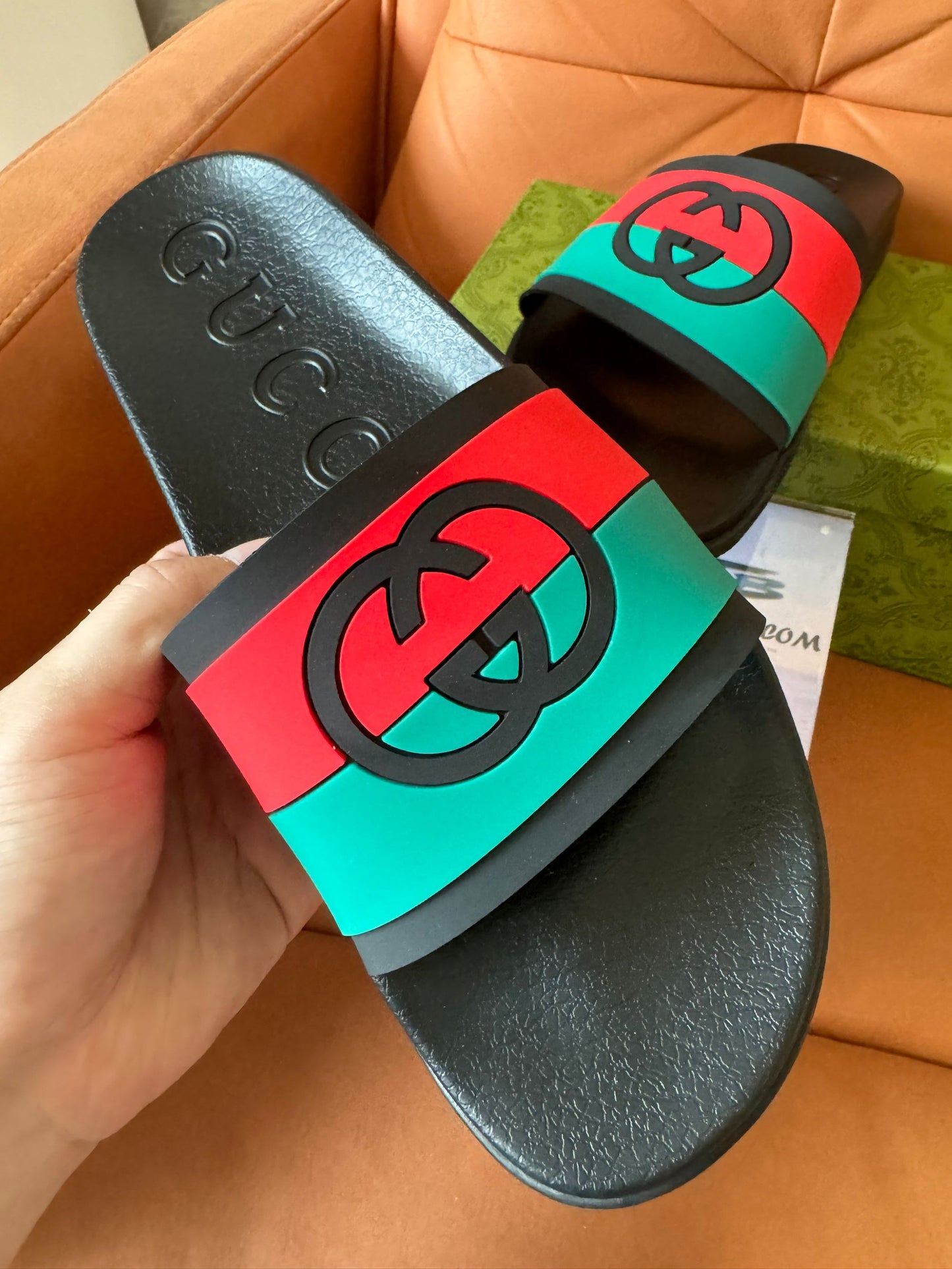 Gucci GG rubber slide sandals in web stripe