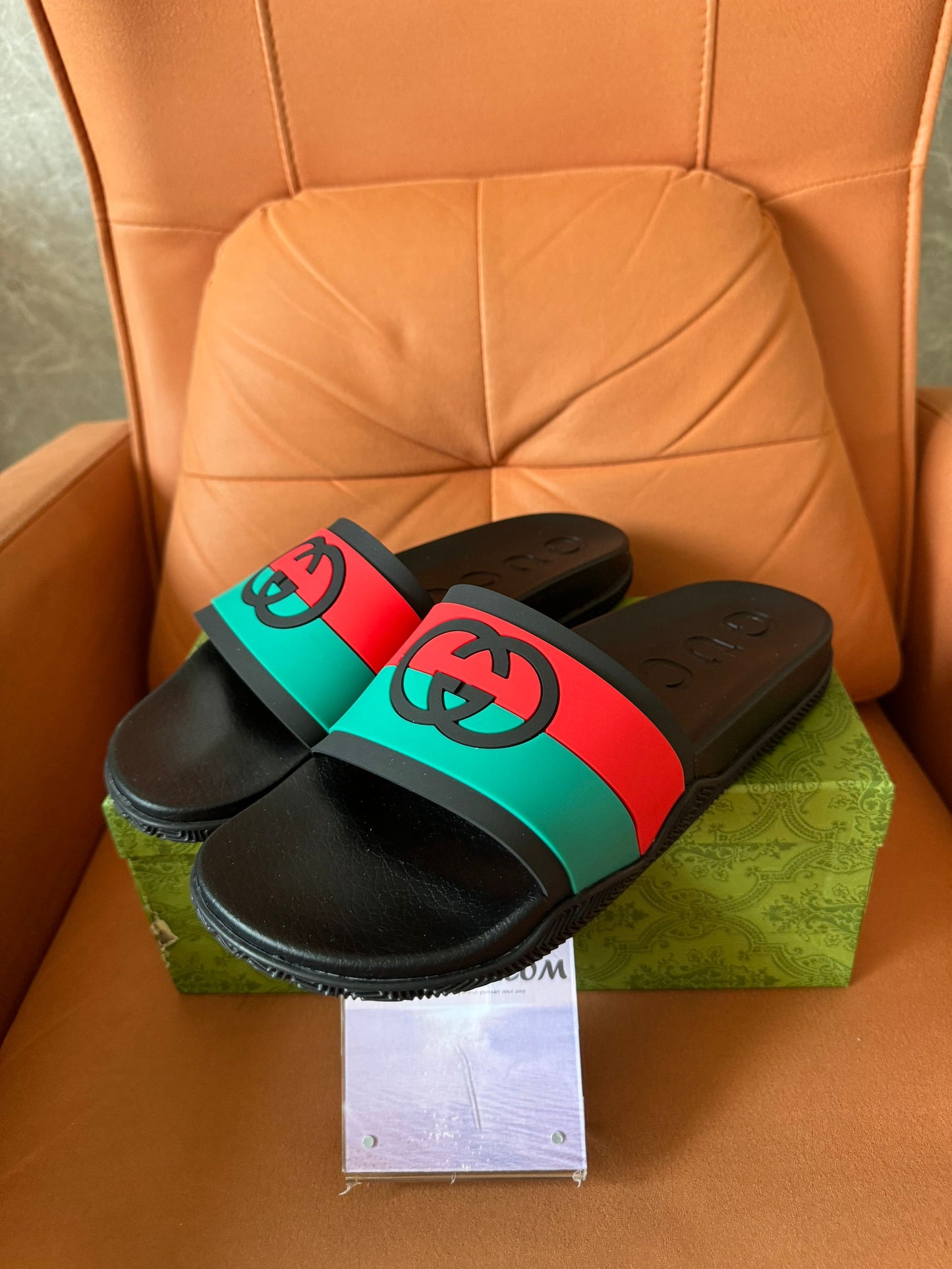 Gucci GG rubber slide sandals in web stripe