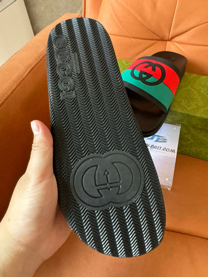 Gucci GG rubber slide sandals in web stripe