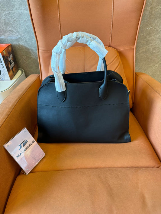 The Row soft margaux 15 bag black saddle