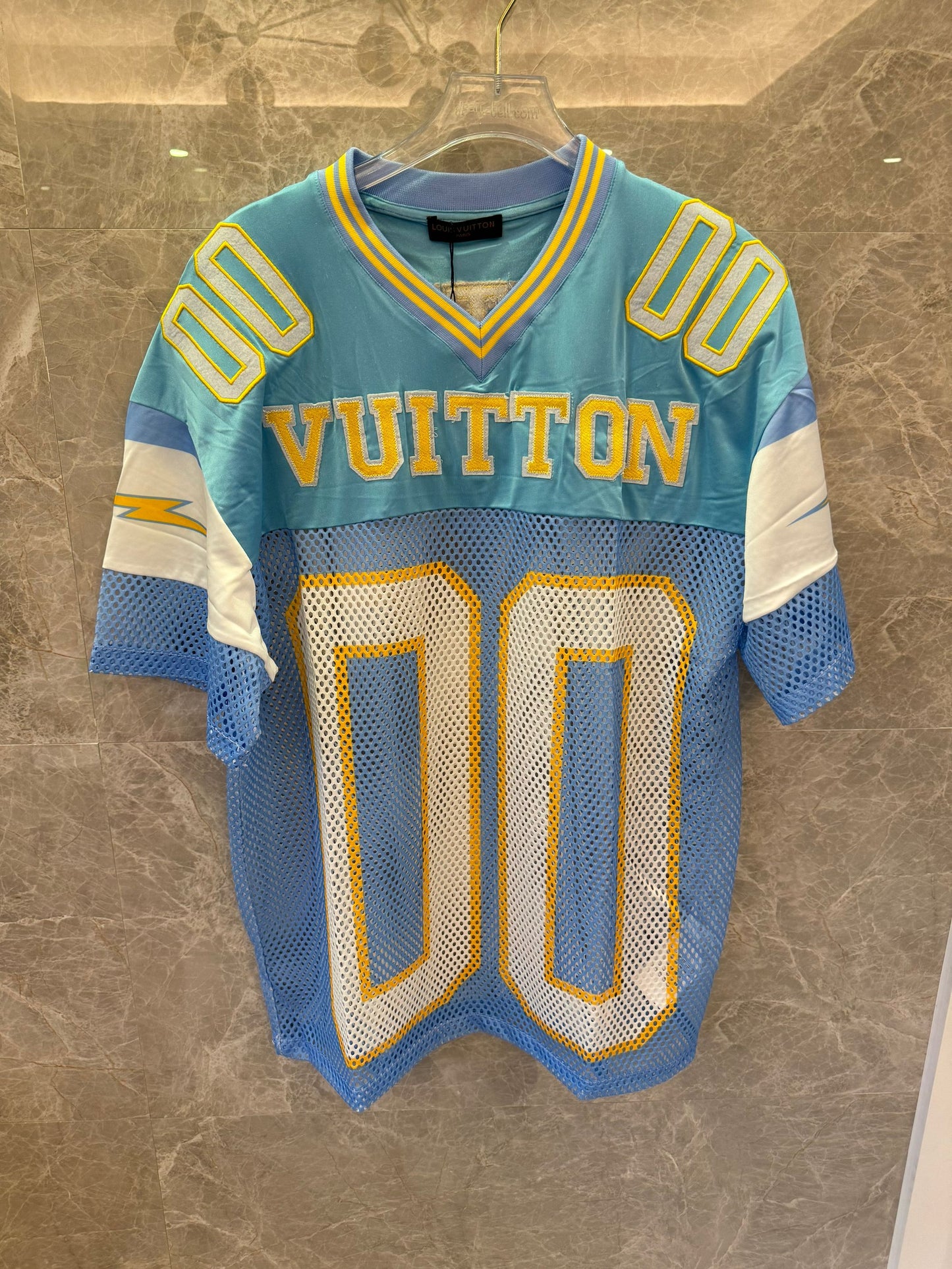 Louis Vuitton vintage-style blue and yellow mesh jersey with "00" number