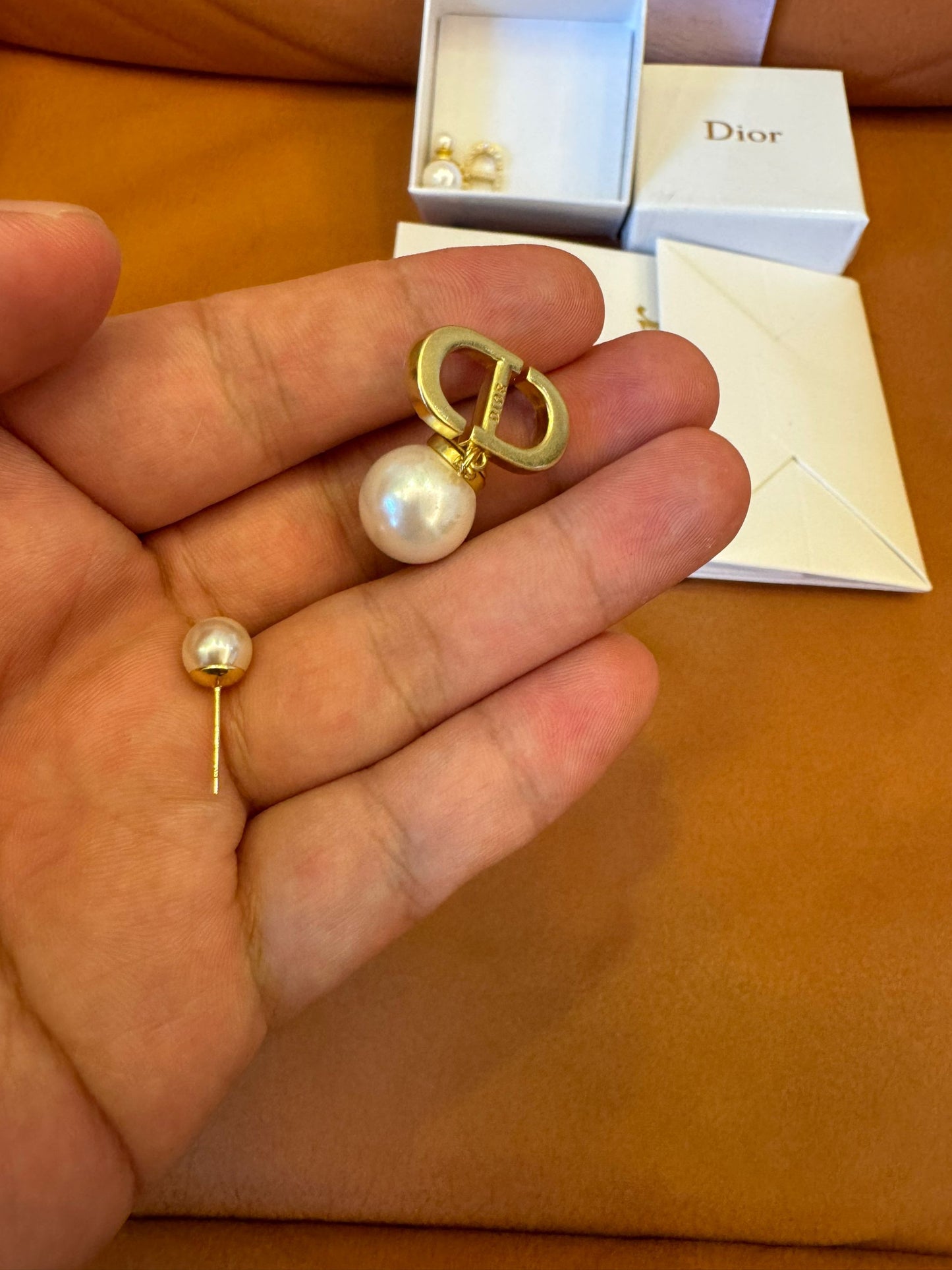 Dior Tribales earrings with pearl and CD logo design