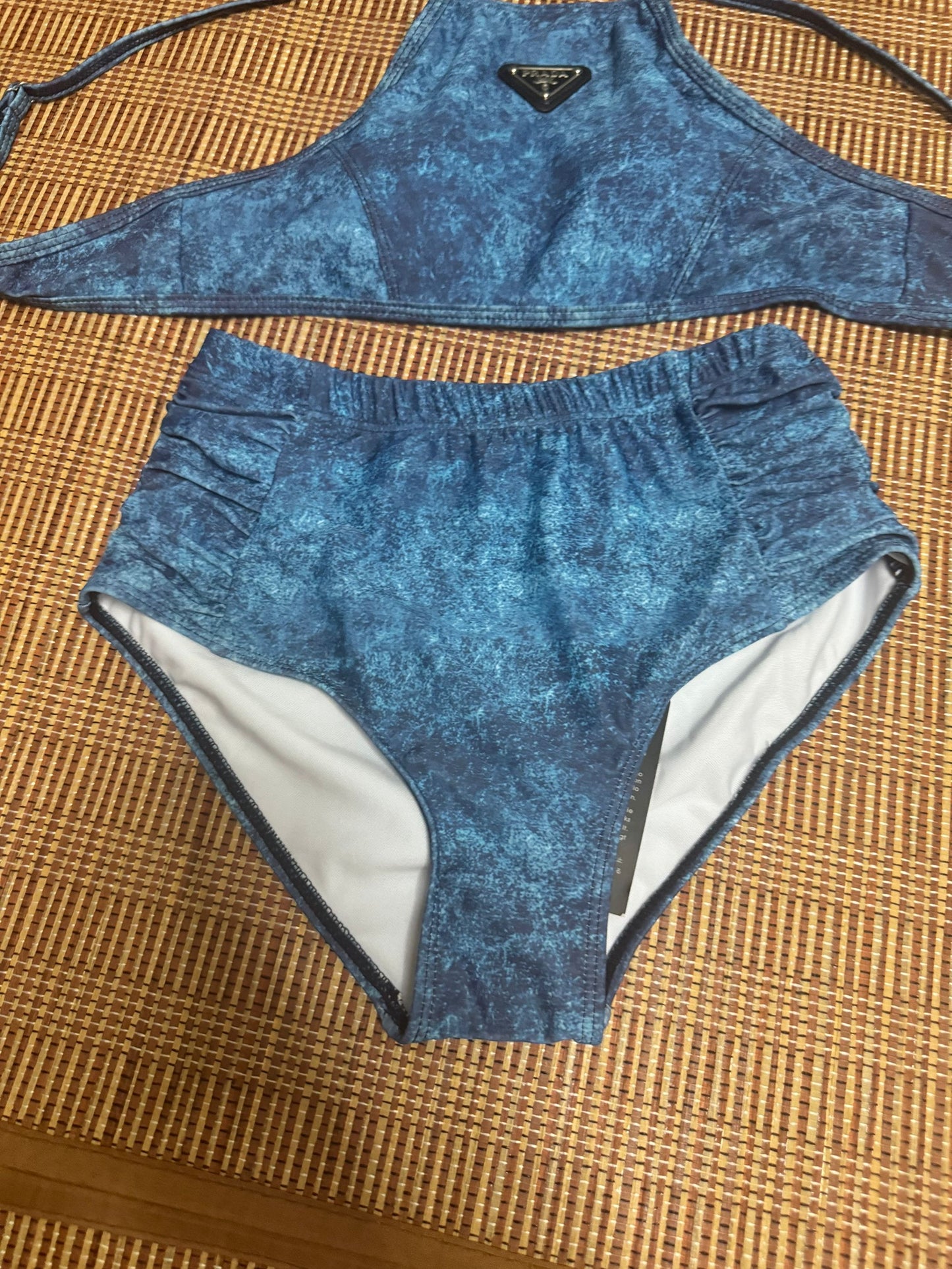 Prada blue acid-wash bikini set with logo detail