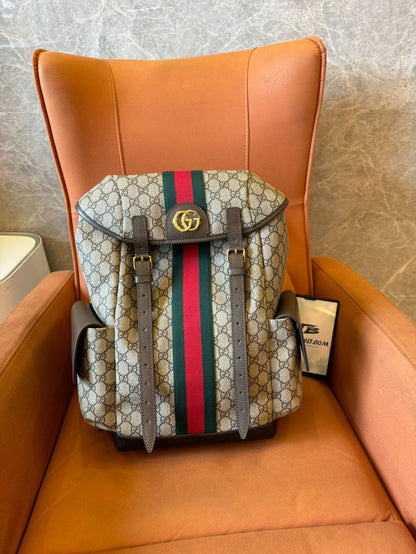 Gucci GG Supreme canvas backpack with web stripe and double buckle design