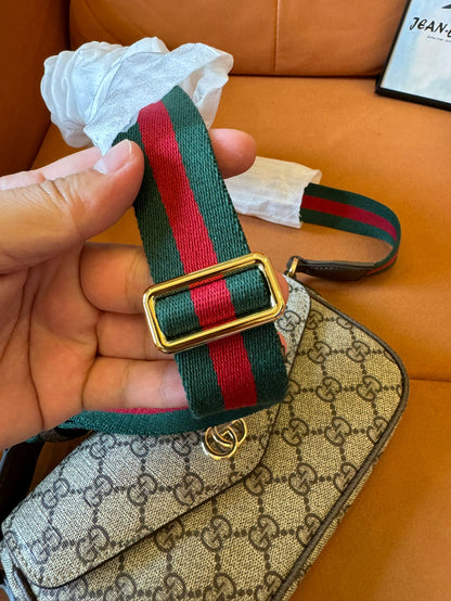 Gucci GG Supreme small shoulder bag with web strap