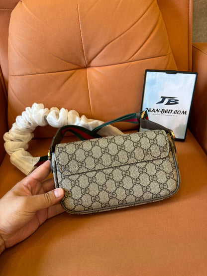 Gucci GG Supreme small shoulder bag with web strap