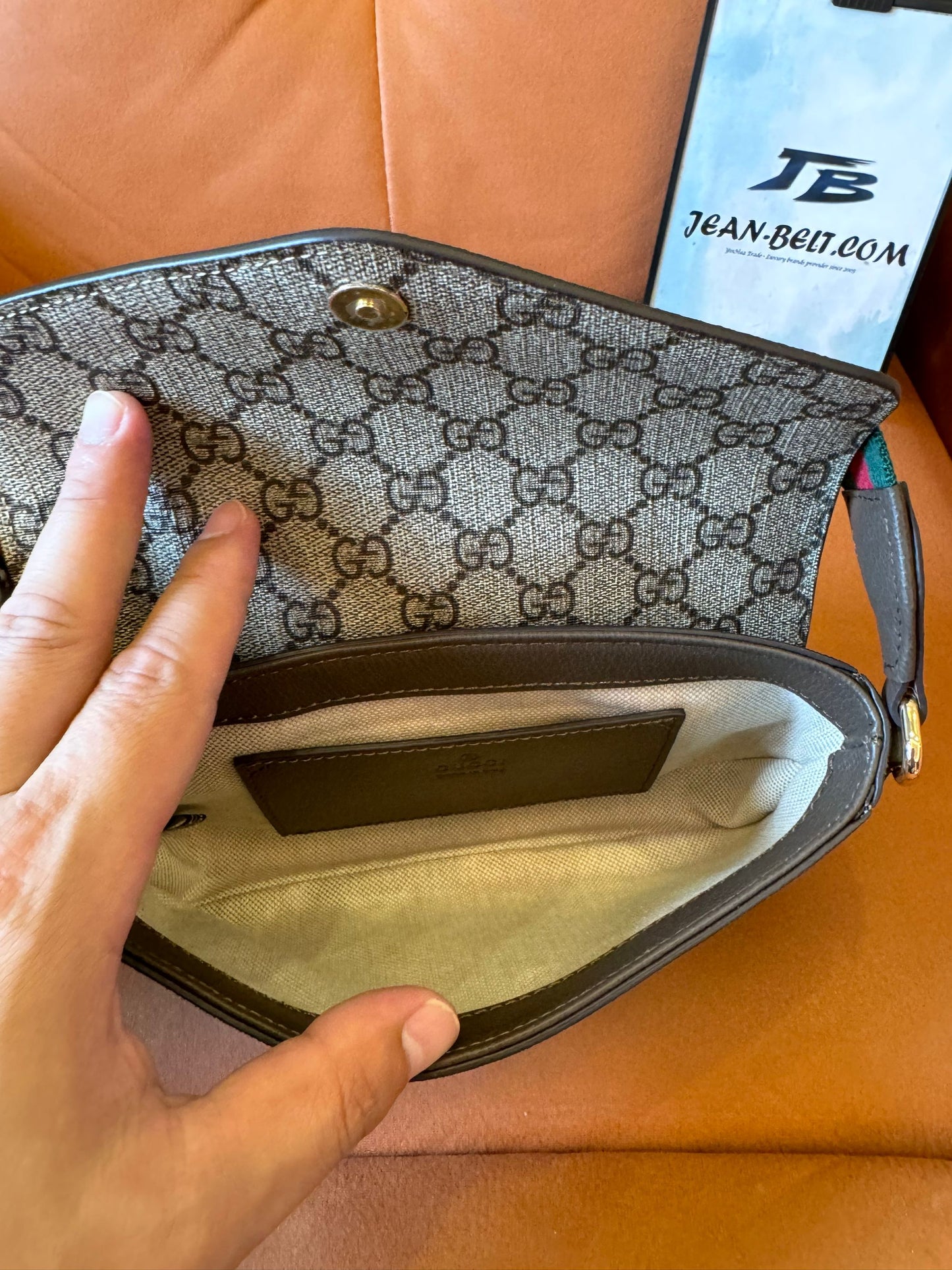 Gucci GG Supreme small shoulder bag with web strap