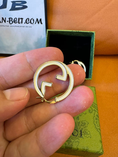 Gucci GG logo hoop earrings in gold-tone metal