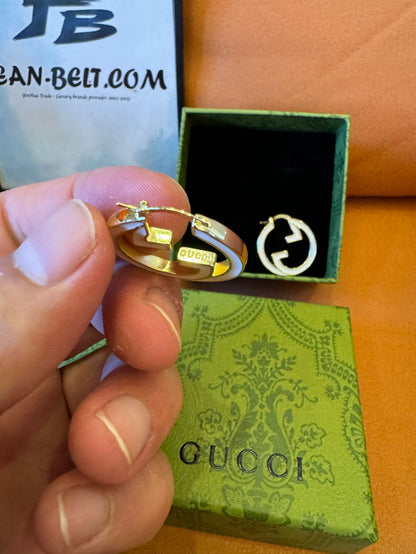 Gucci GG logo hoop earrings in gold-tone metal