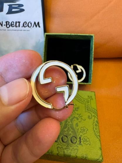 Gucci GG logo hoop earrings in gold-tone metal