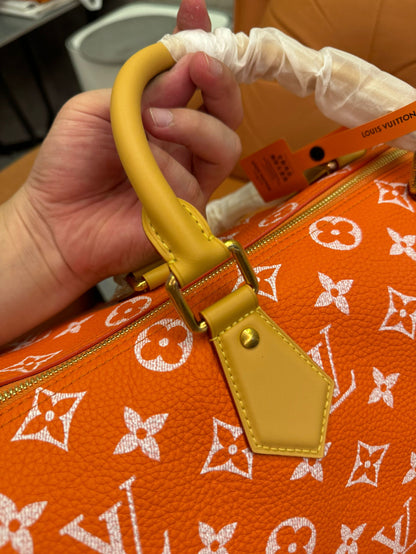 Louis Vuitton monogram orange canvasspeedy bandoulière 30