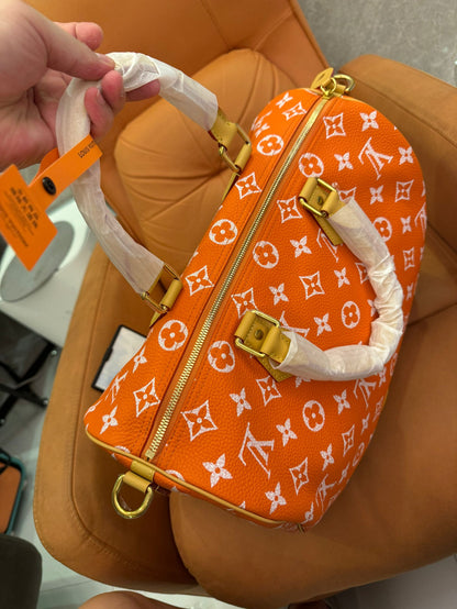 Louis Vuitton monogram orange canvasspeedy bandoulière 30