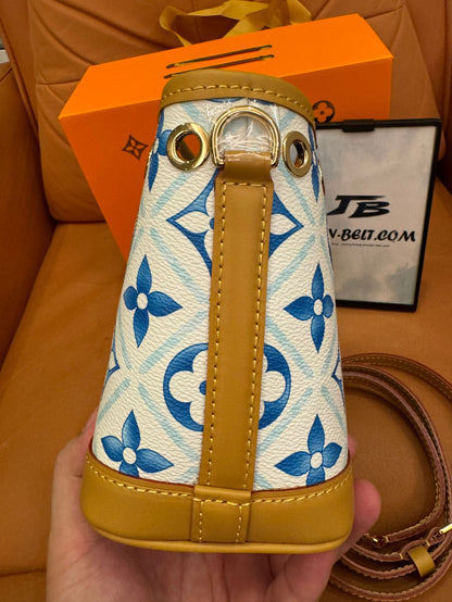 Louis Vuitton limited edition  mini bucket bag in blue and white with gold-tone hardware