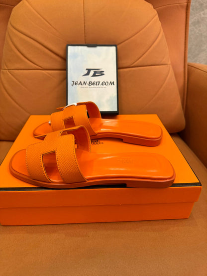 Hermès Oran sandals orange sunset