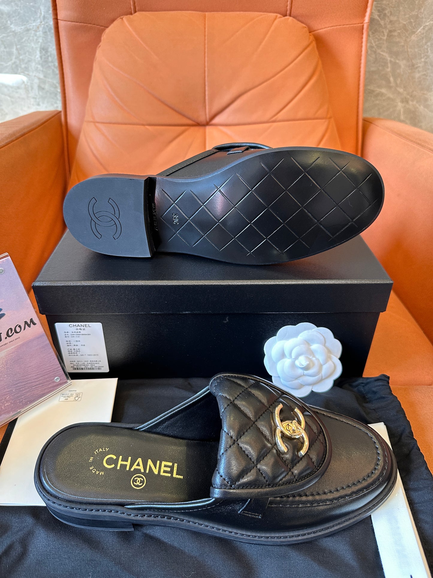 Chanel quilted leather slippers with gold CC logo