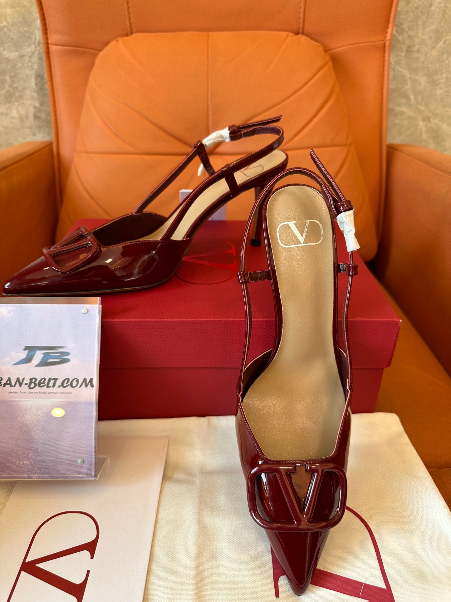 Valentino Garavani VLogo slingback pumps in burgundy patent leather