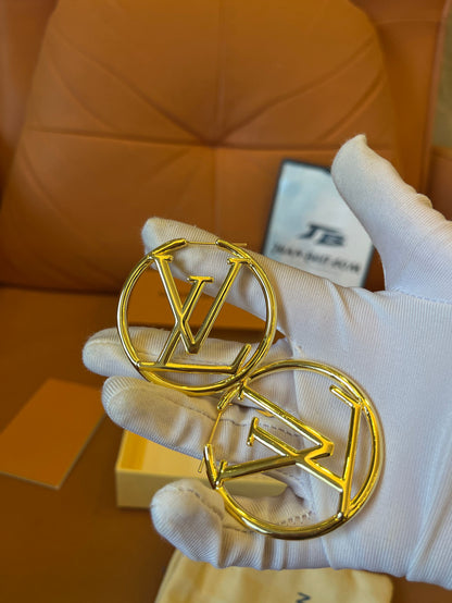 Louis Vuitton  gold hoop earrings