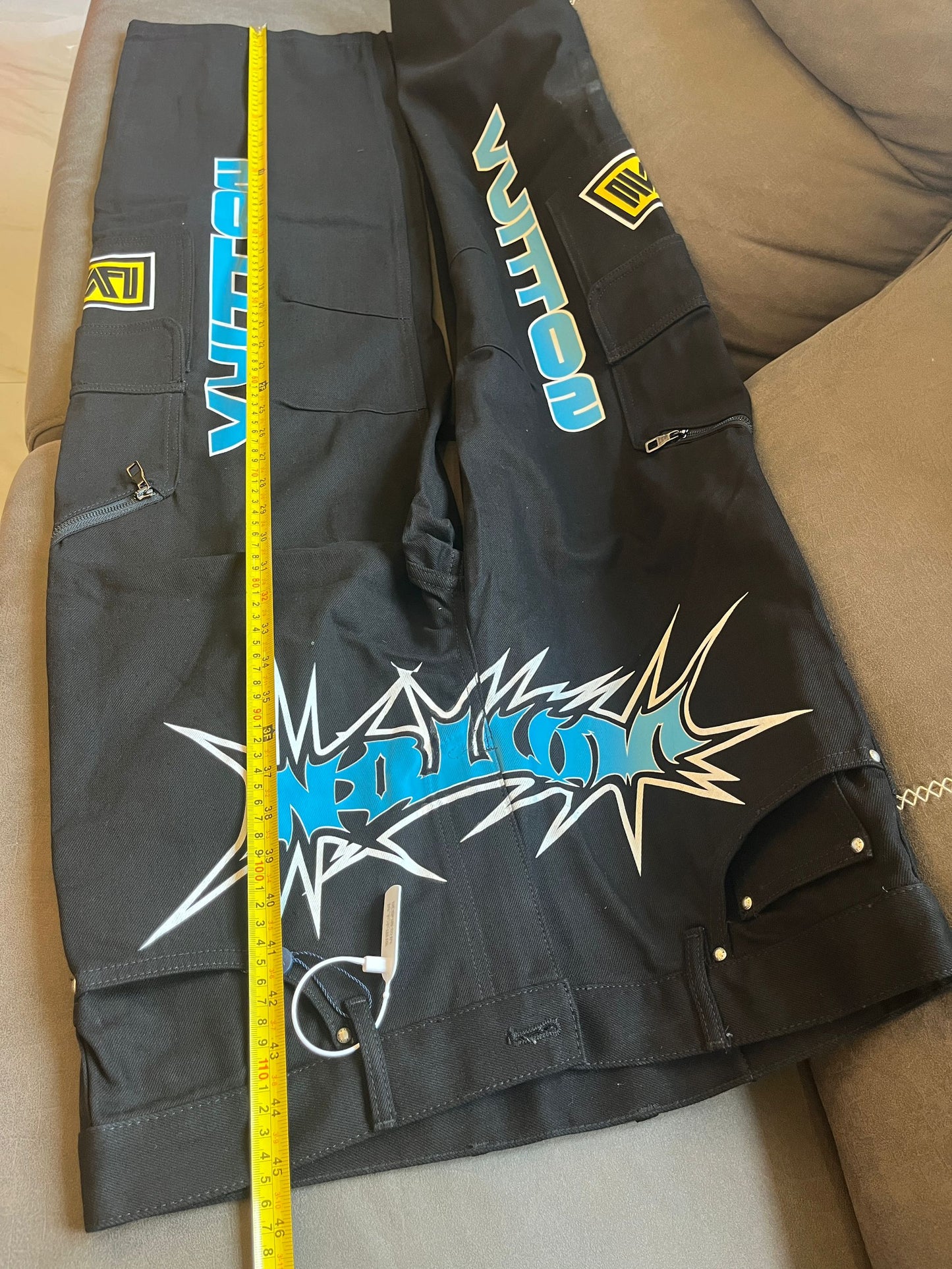 Louis Vuitton racing printed denim pants