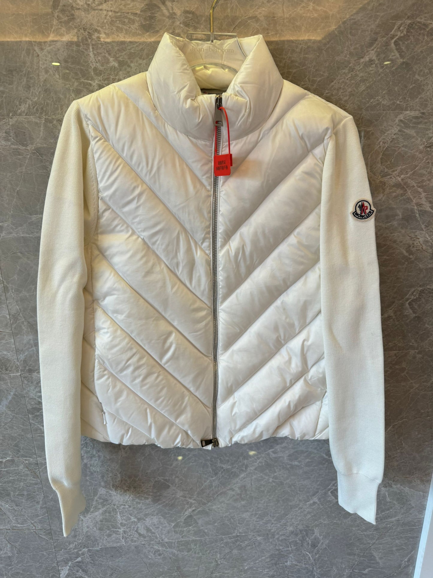 Moncler down jacket with knit sleeves for women white