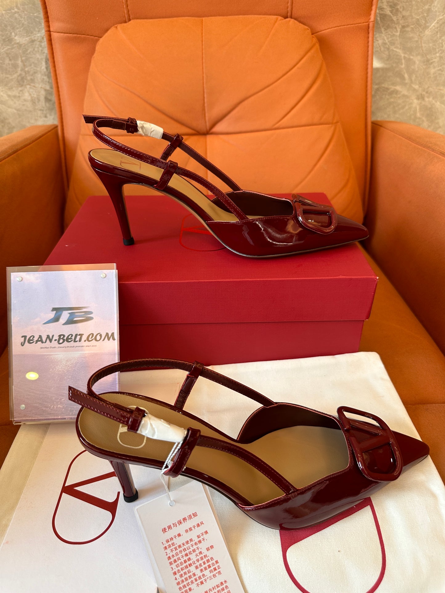 Valentino Garavani VLogo slingback pumps in burgundy patent leather