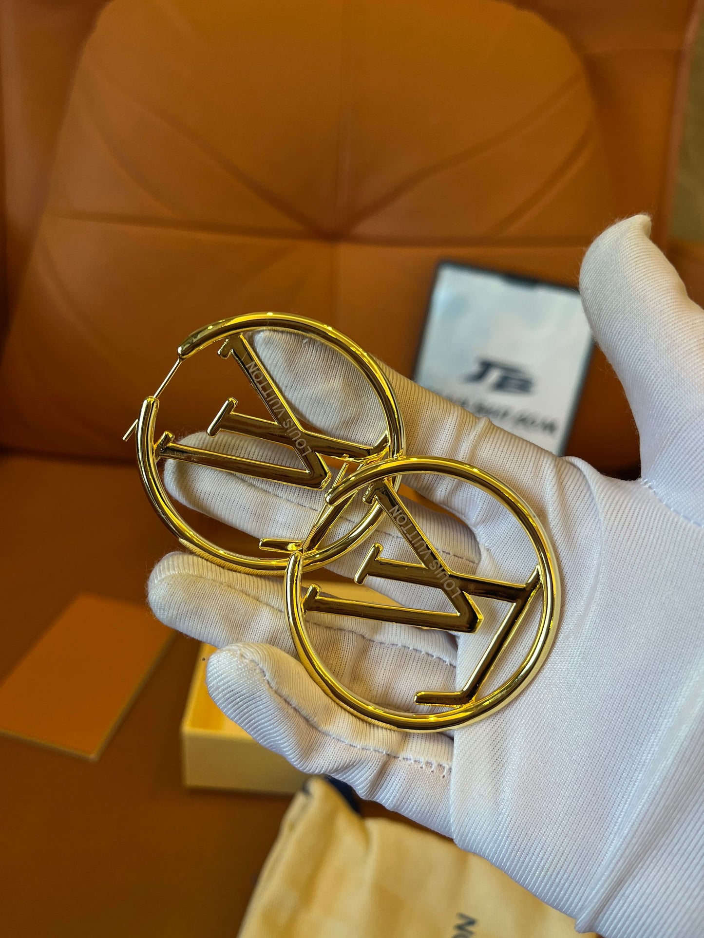 Louis Vuitton  gold hoop earrings