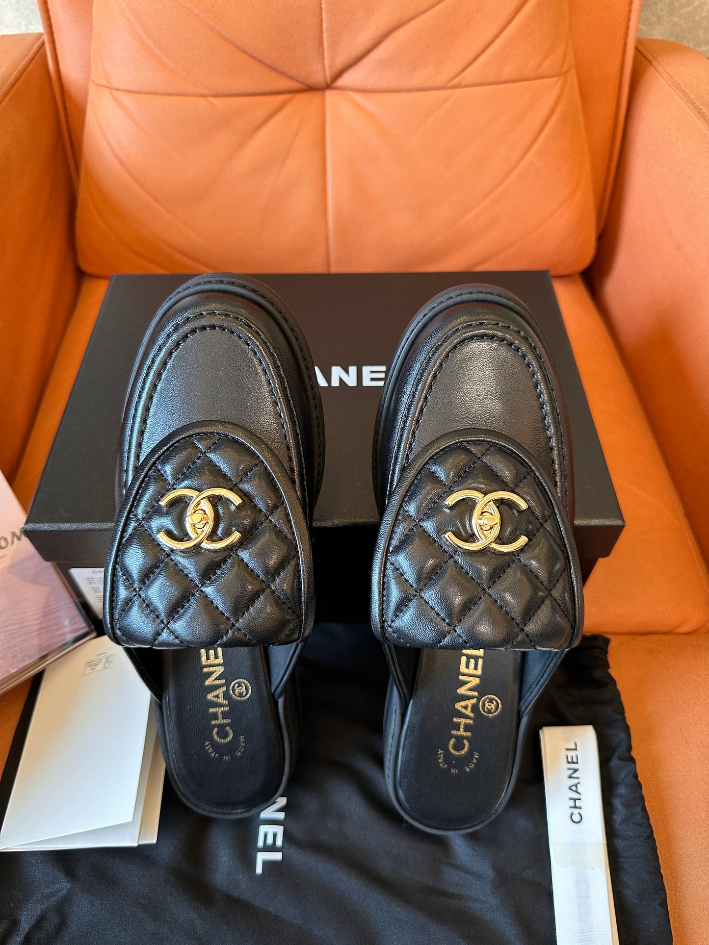 Chanel quilted leather slippers with gold CC logo