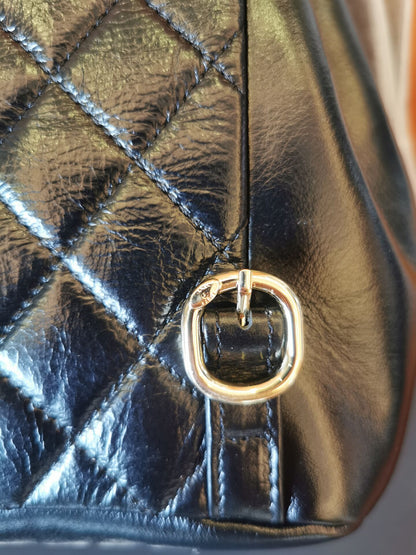 Chanel glazed aged calfskin quilted small duma drawstring backpack black