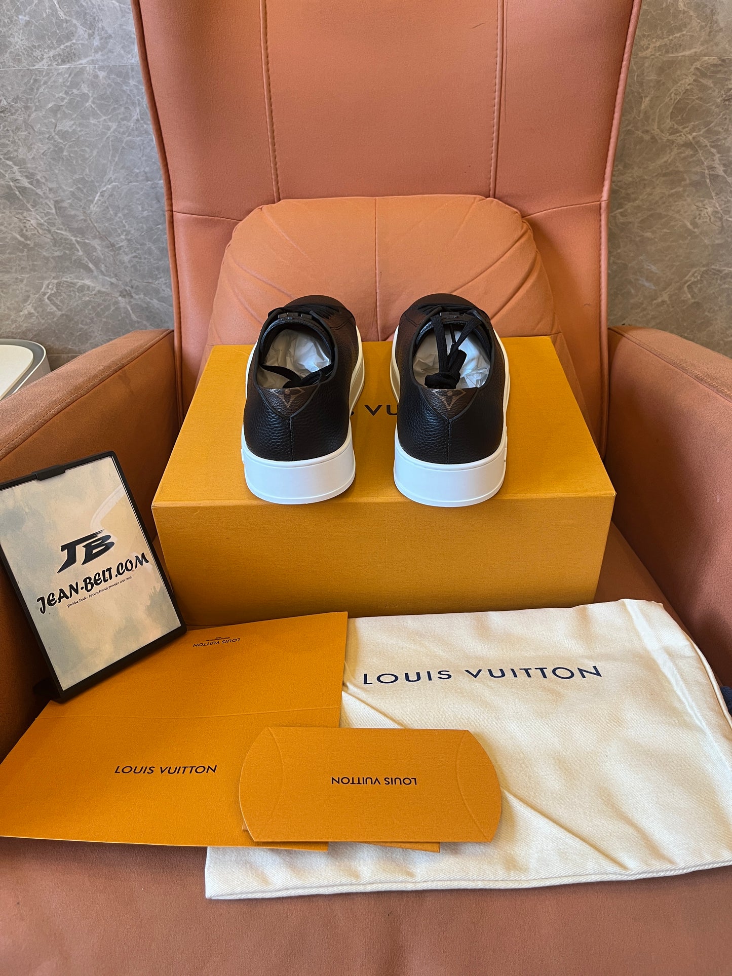 Louis Vuitton pebbled leather resort sneaker black