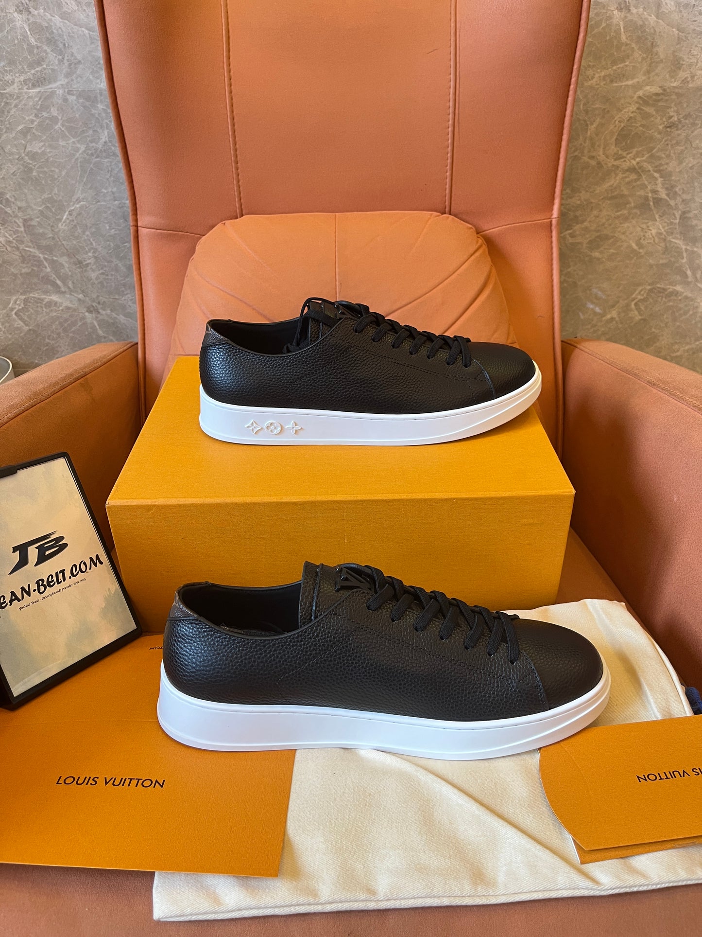 Louis Vuitton pebbled leather resort sneaker black