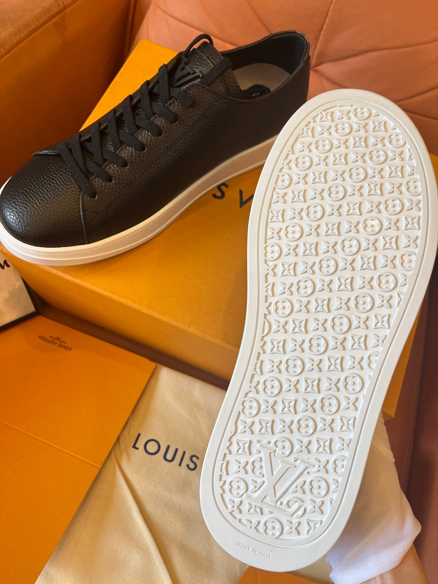 Louis Vuitton pebbled leather resort sneaker black