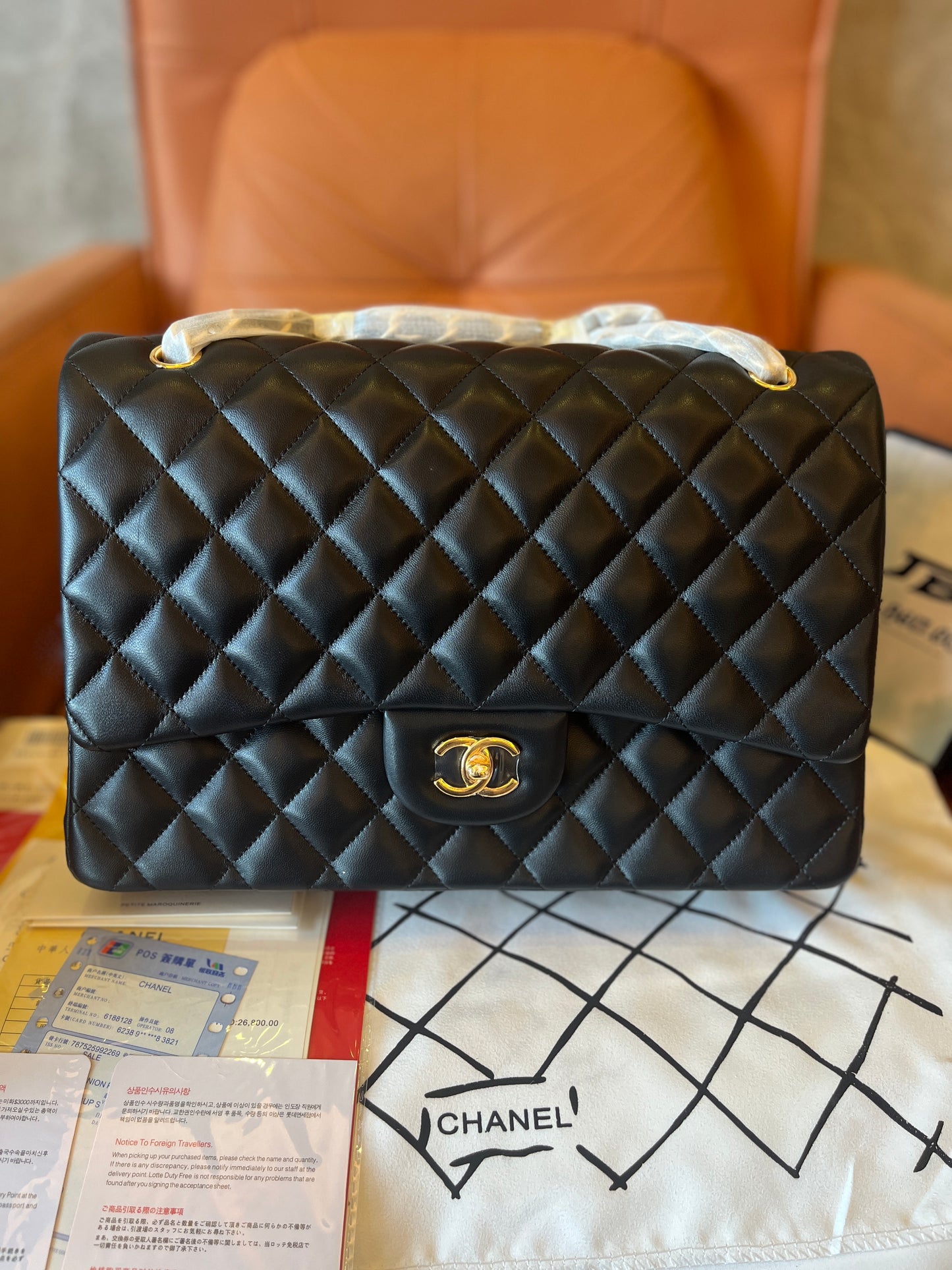 Chanel quilted maxi classic double flap bag