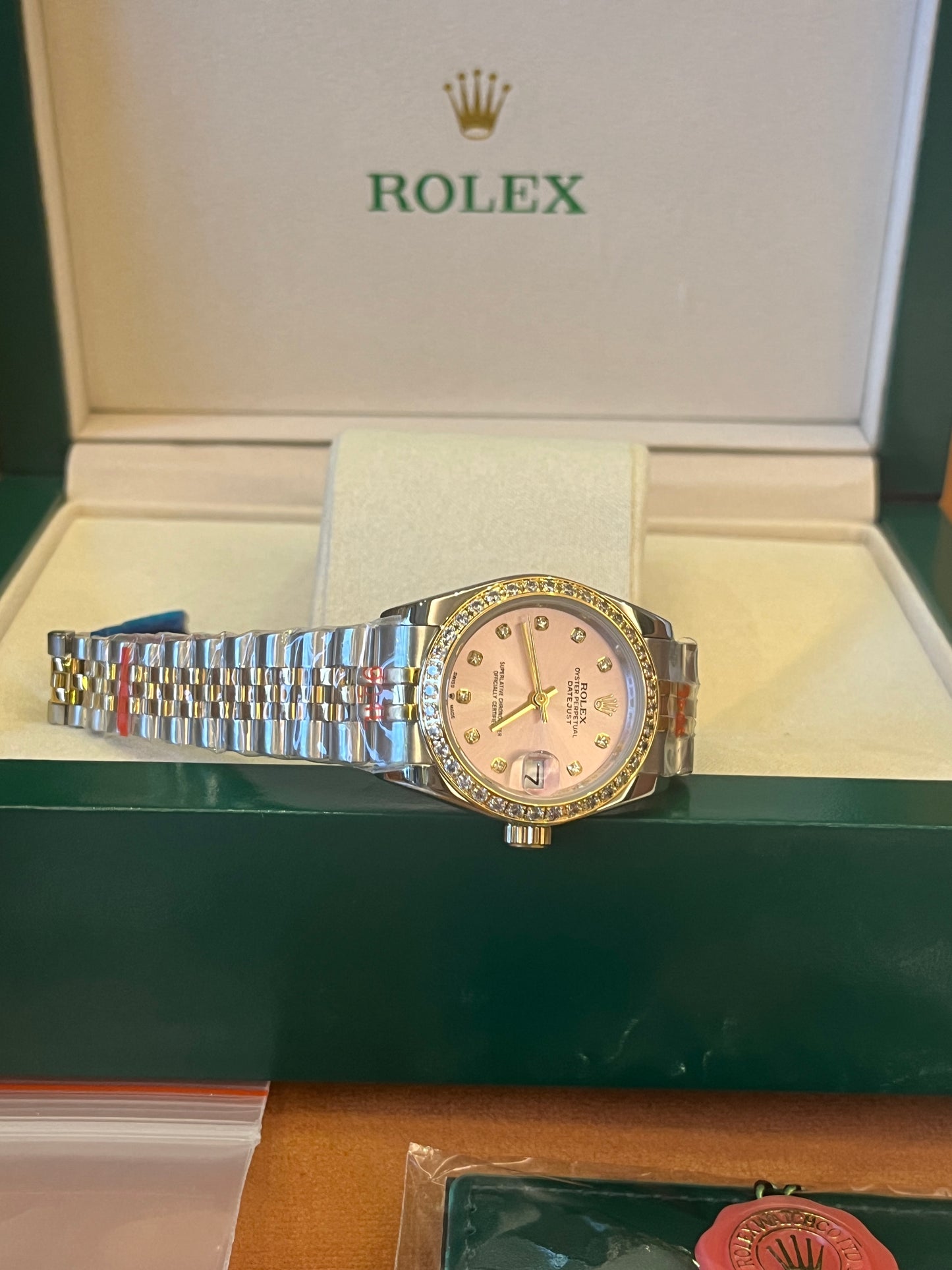 Rolex datejust 31 mm pink mother of pearl dial two tone diamond watch