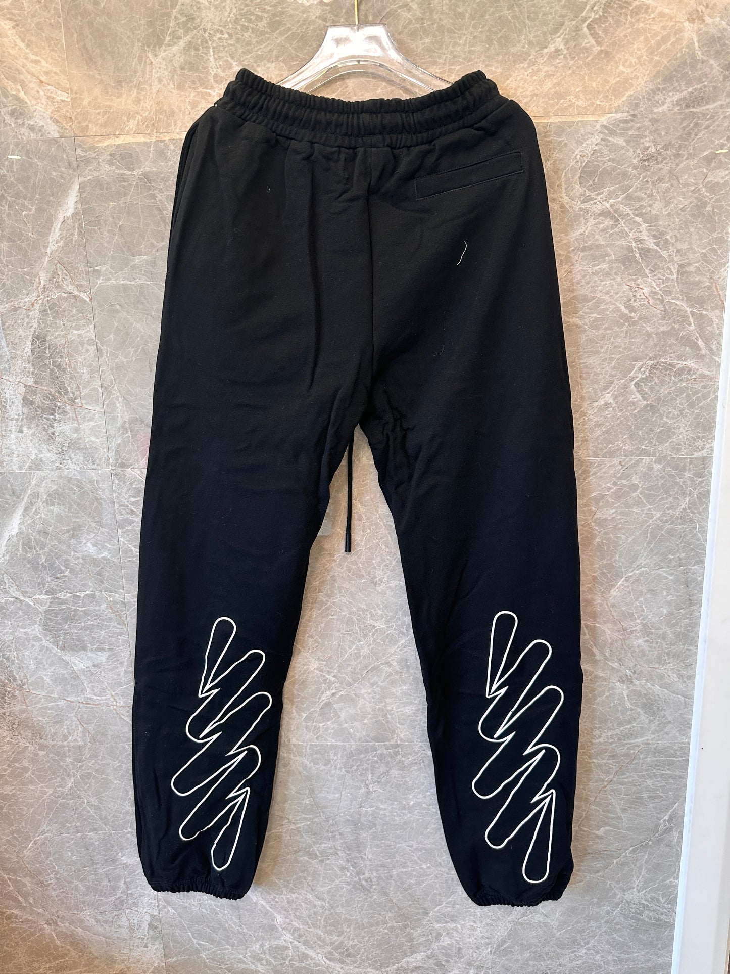 Off-White black jogger pants with zig-zag design