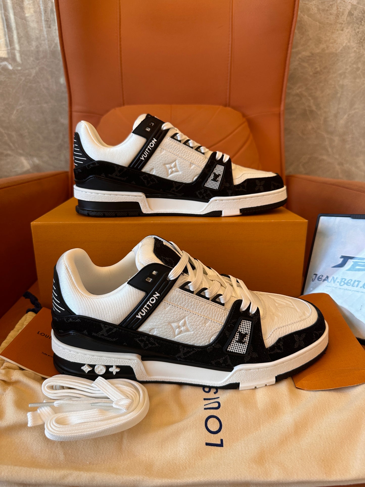 Louis Vuitton trainer sneakers in white and black monogram canvas