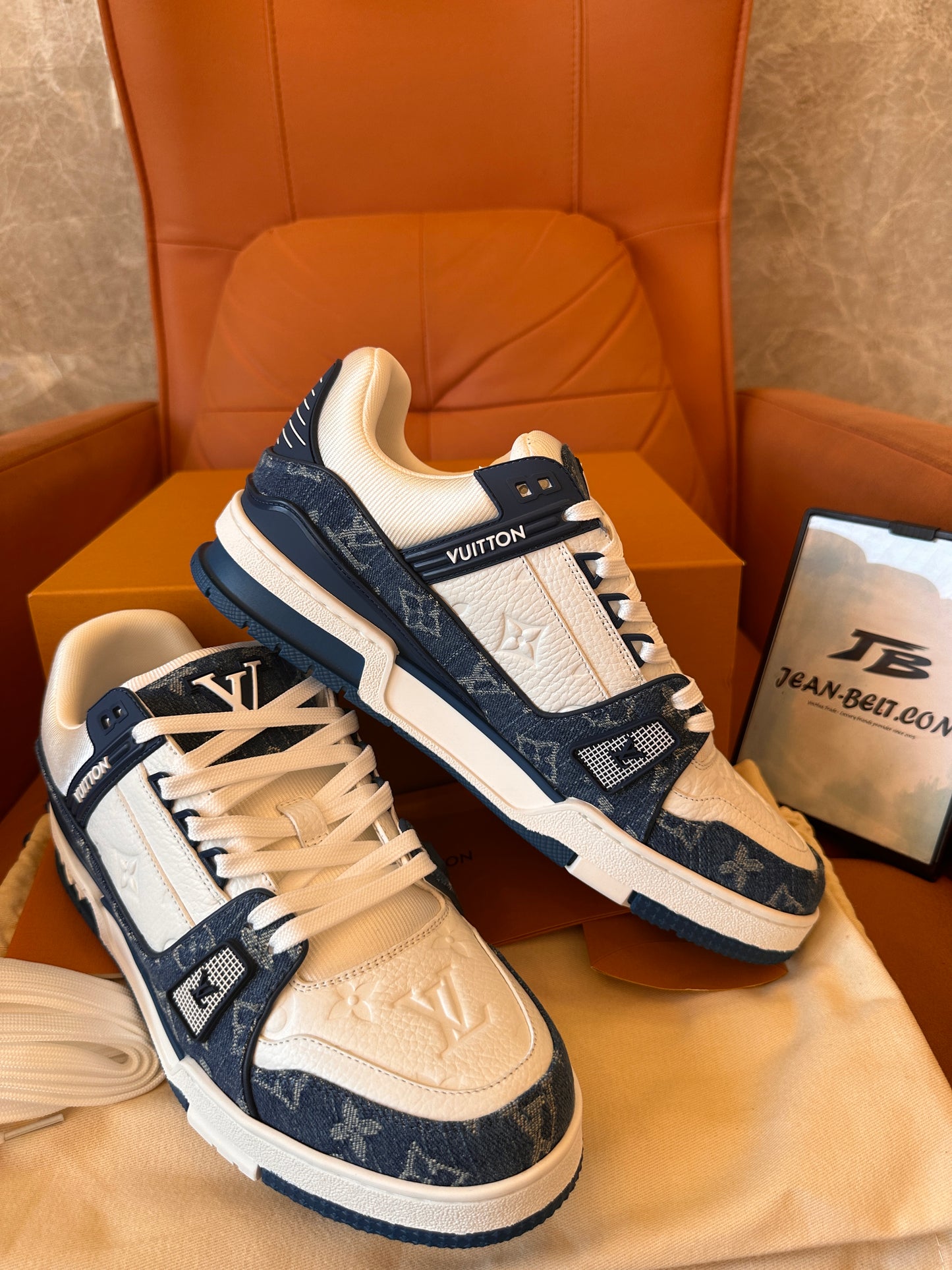 Louis Vuitton trainer sneakers in white and blue monogram canvas