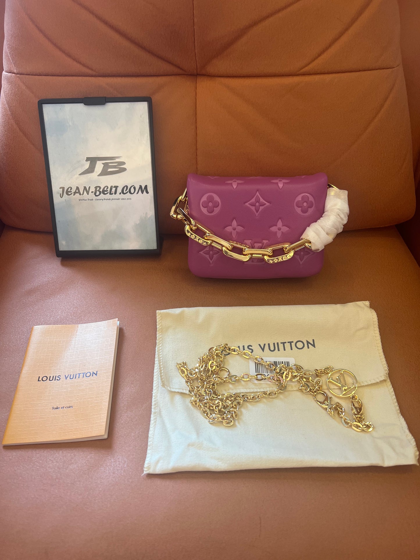 Louis Vuitton lambskin embossed monogram coussin belt bag orchid