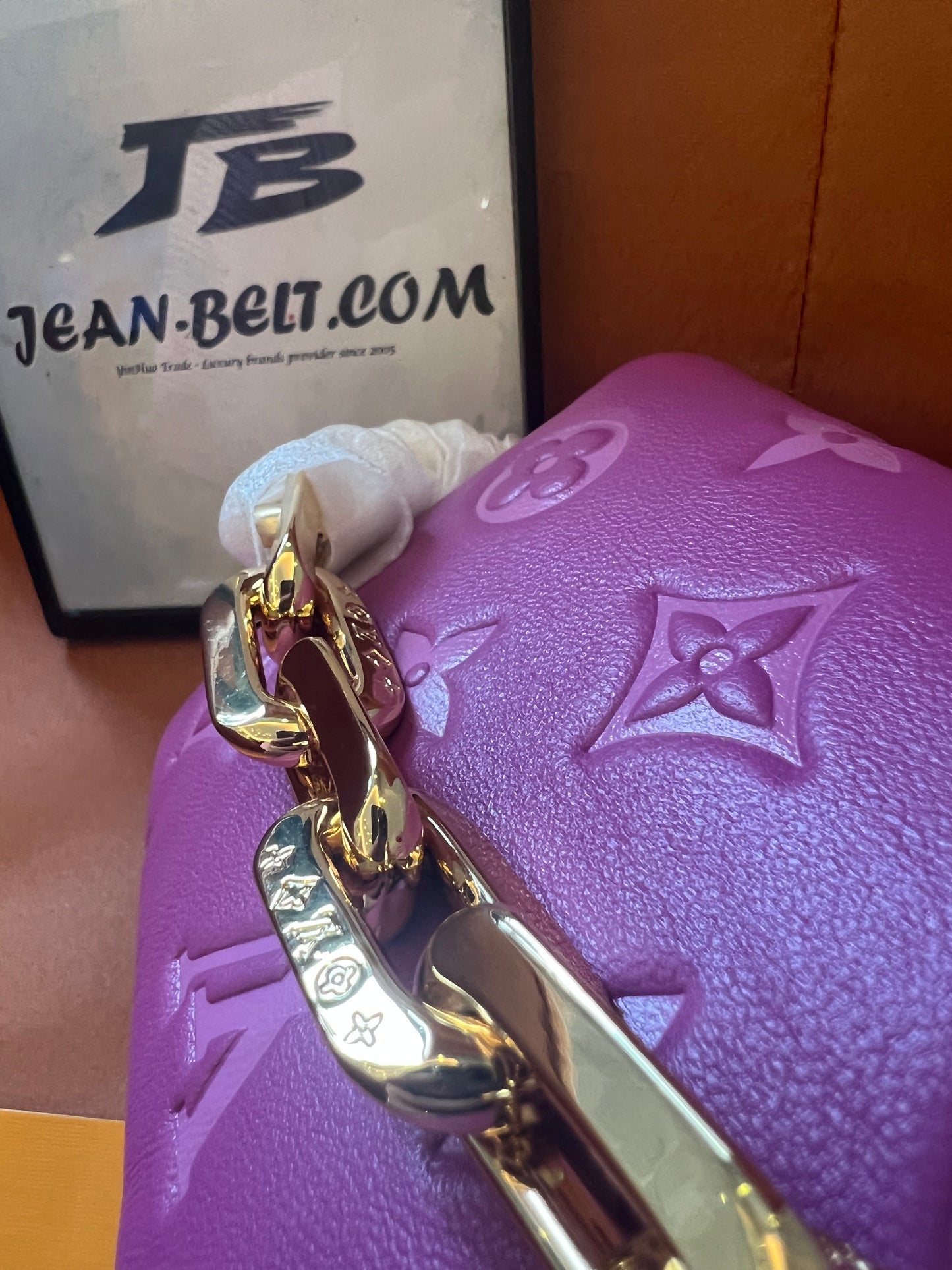 Louis Vuitton lambskin embossed monogram coussin belt bag orchid