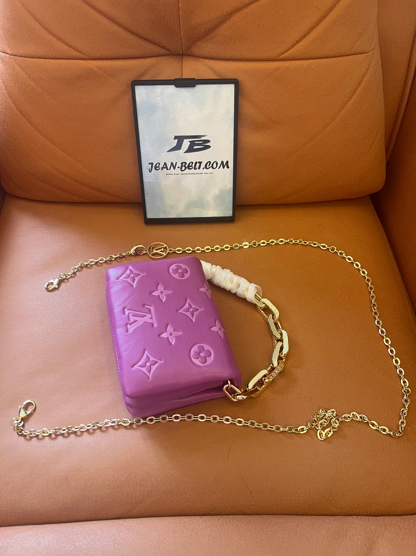 Louis Vuitton lambskin embossed monogram coussin belt bag orchid