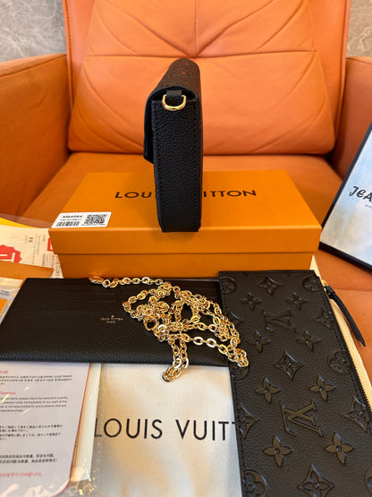 Louis Vuitton Pochette Félicie in monogram empreinte leather