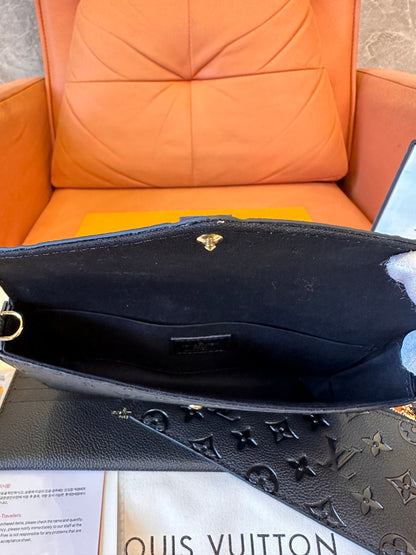 Louis Vuitton Pochette Félicie in monogram empreinte leather