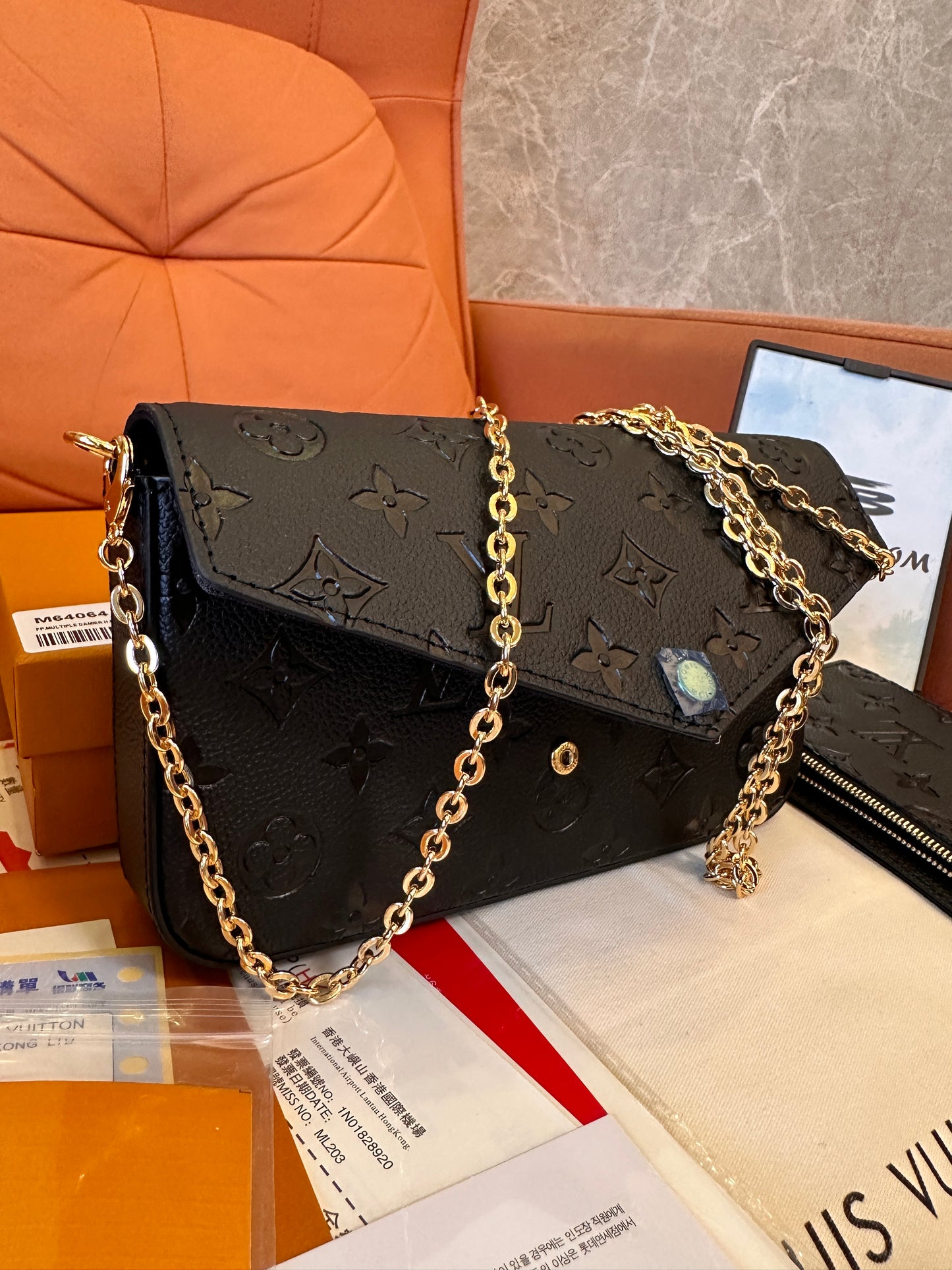 Louis Vuitton Pochette Félicie in monogram empreinte leather