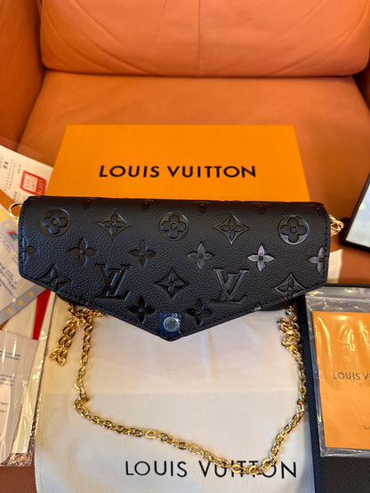 Louis Vuitton Pochette Félicie in monogram empreinte leather