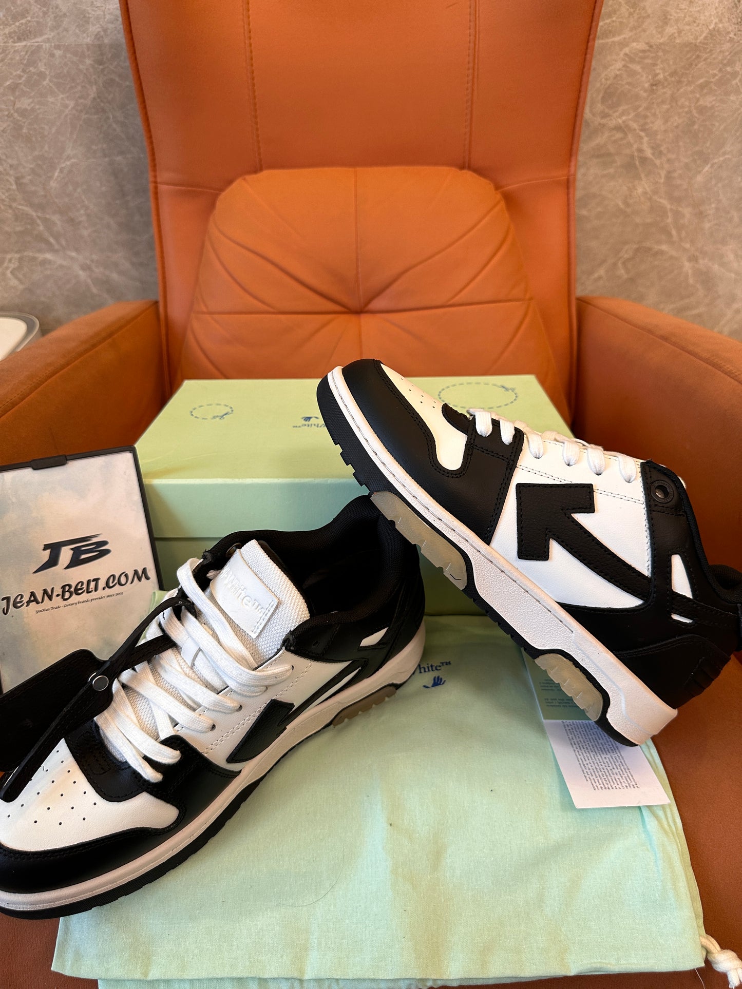 Off-White™ low-top arrow sneakers in black and white