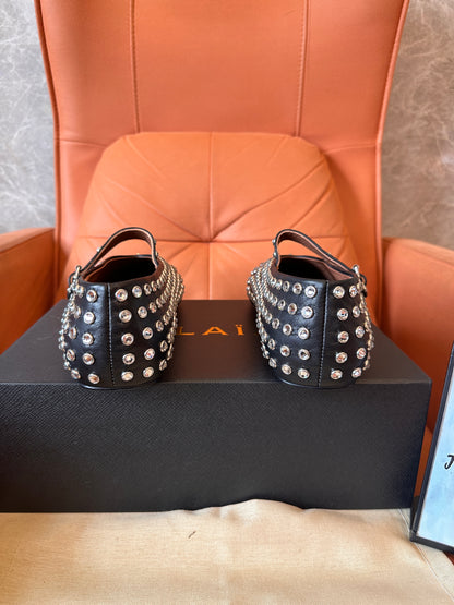 Alaïa studded leather mary jane flats