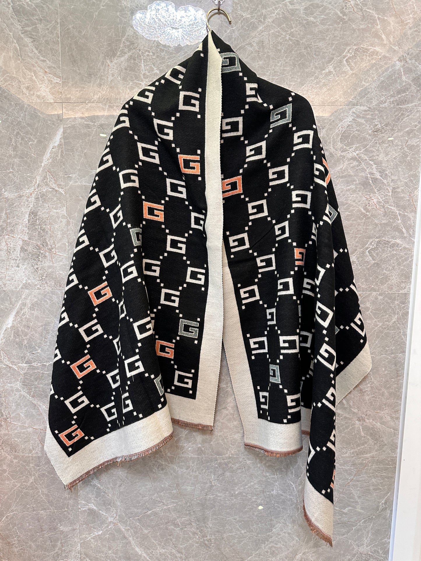 Gucci reversible two-tone wool scarf with signature branding