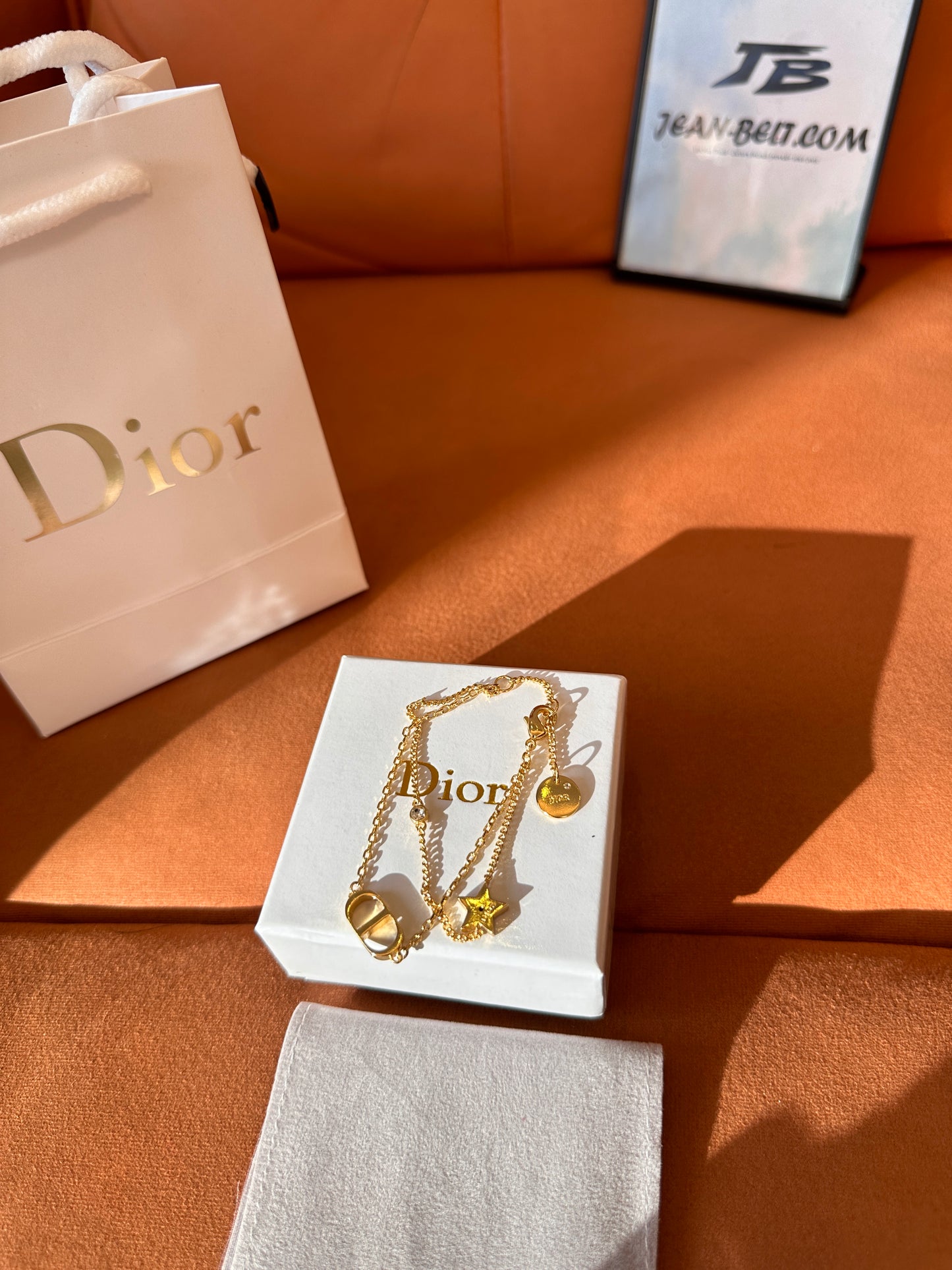 Dior gold-finish CD chain bracelet with star charm